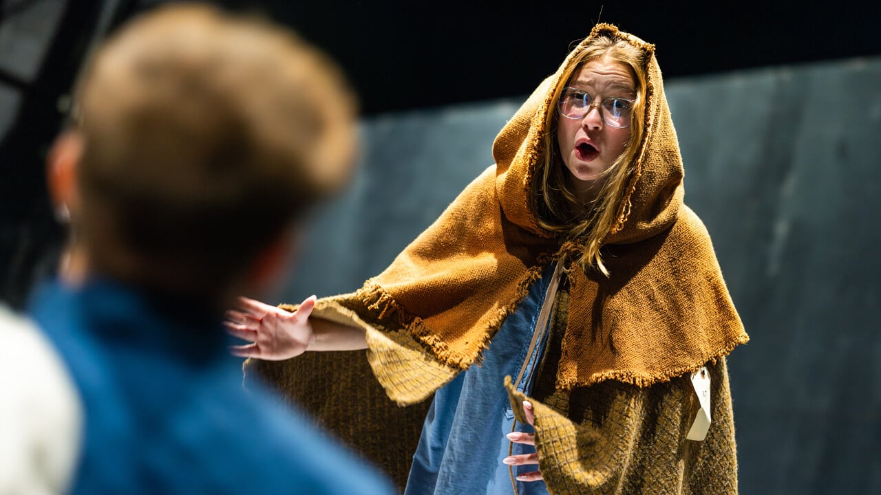 Natalie Young, ’27, rehearses her role in “Professor Woland’s Black Magic Rock Show”