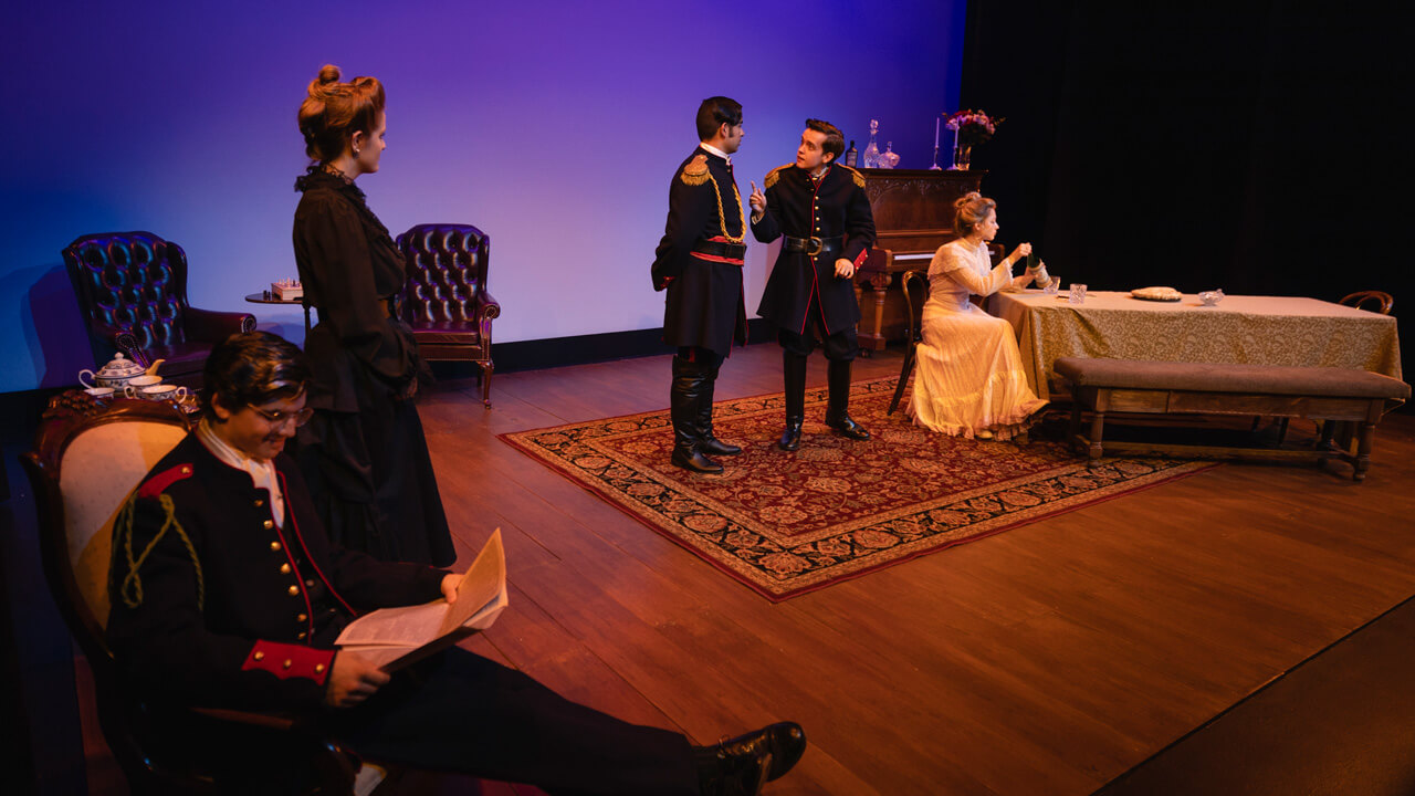 A group of student actors on stage for the production, Three Sisters